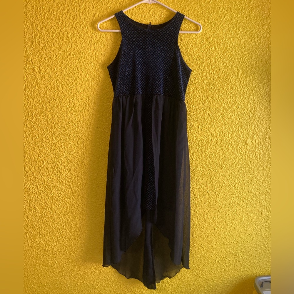 A blue sparkle dress that’s been worn only 3 times, and is in good condition.